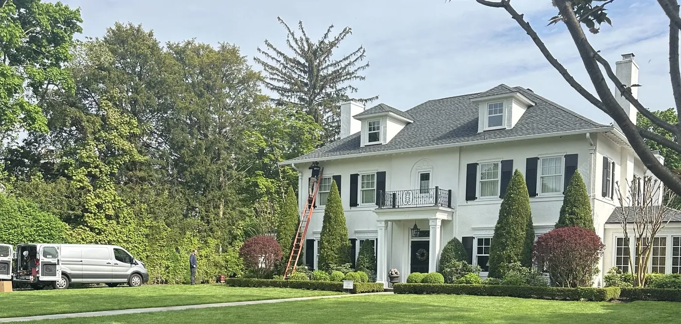 Smart Tek service van arriving at a Long Island home